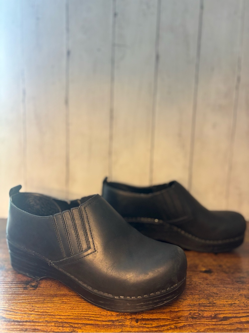 Dansko Black Slip-On Women's Clogs
